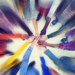 Group of People Hands Clasped Concept